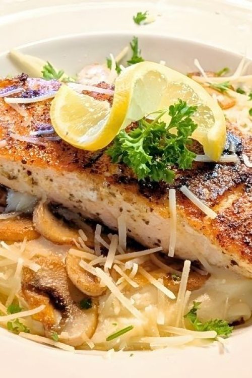 Our forest and sea pasta comes with salmon and mushrooms over an alfredo sauce.